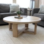 Adding A Round White Wood Coffee Table To Your Home Decor